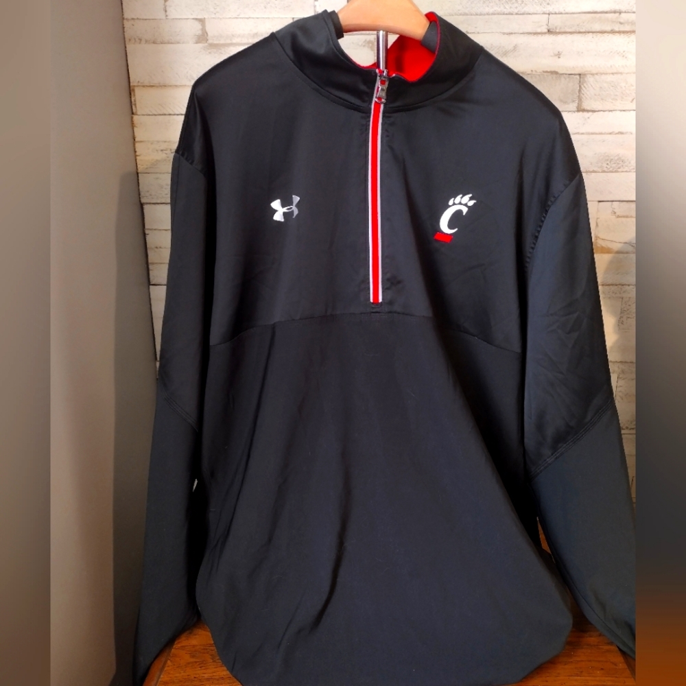 Under Armour half zip jacket with UC logo.